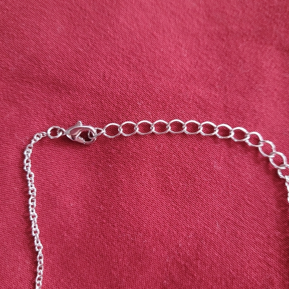 Silver colored necklace with palm tree - Picture 5 of 6